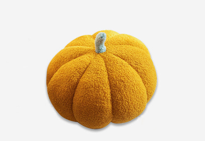 Pumpkin-shaped cushion with soft texture. | Pumpaformad kudde med mjuk textur.