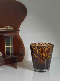 Small cup with leopard pattern, vintage style. | Liten kopp med leopardmönster, vintagestil.