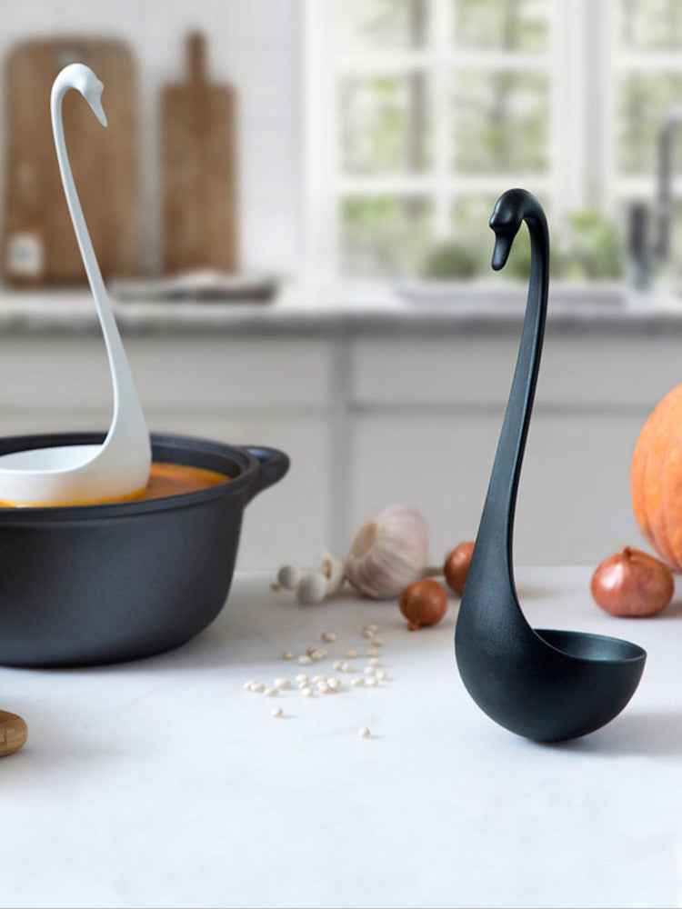 Soup ladle, swan shaped, standing on table. | Soppslev, svanformad, står på bord.