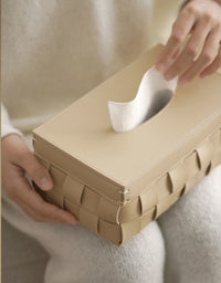 Cream leather tissue box on cream background. | Krämig lädernäsduksask på krämig bakgrund.